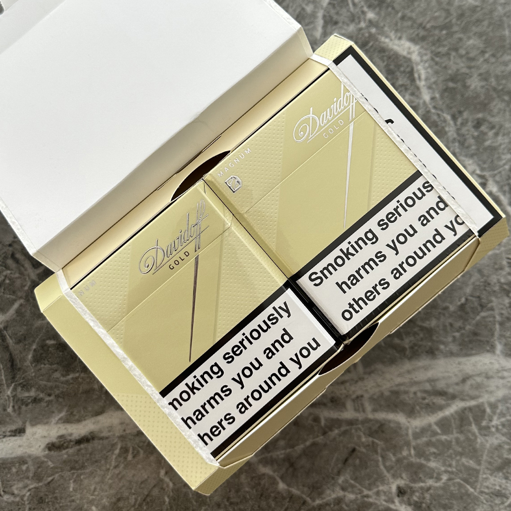 Opened Davidoff Gold cigarette carton showing two packs for format and presentation comparison