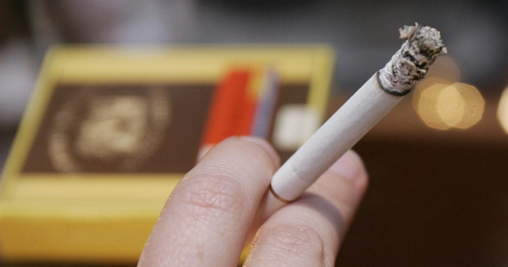 evenly burning cigarette ash close-up